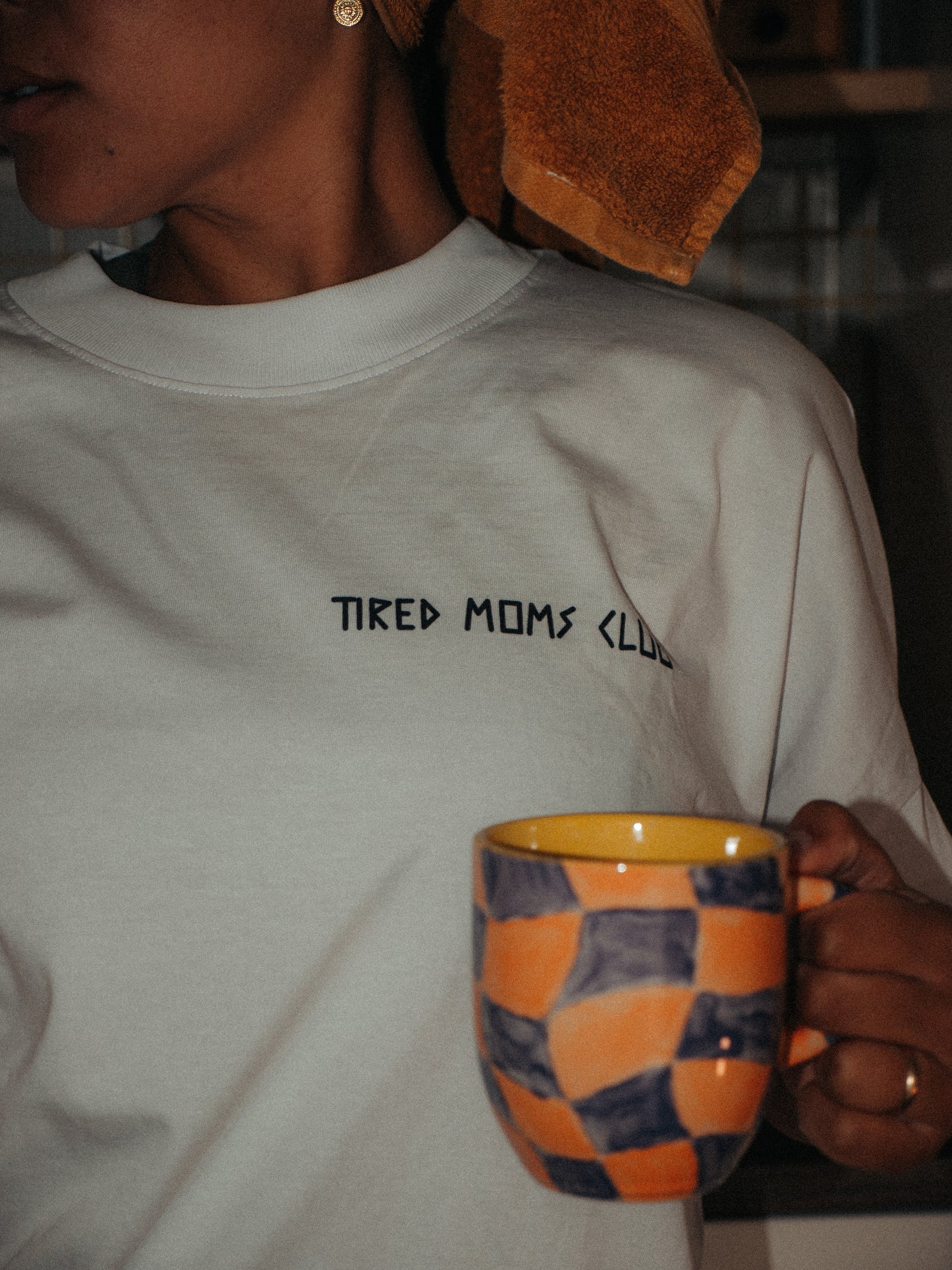 TIRED MOMS CLUB